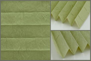 Tkanina Crush Pearl 5179 w kolorze zielonym o elegancko pomarszczonej fakturze, przepuszczająca światło	