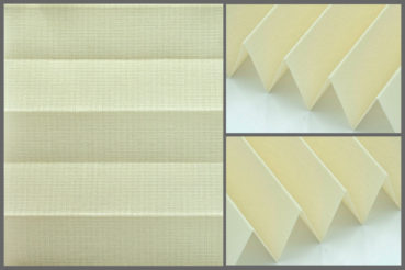 Tkanina plisowana Opera 10194 o subtelnej fakturze przepuszczającej światło w kolorze żółtym.	