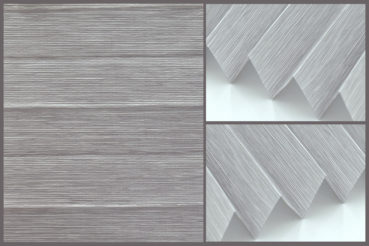 Tkanina plisowana Prato 10750 o delikatnej strukturze i przepuszczająca światło w kolorze szarym.	