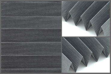 Tkanina plisowana Prato 10754 o delikatnej strukturze i przepuszczająca światło w kolorze szarym.	