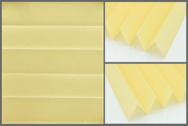 Presto P104 – uniwersalna tkanina plisowana do wnętrz, zapewniająca naturalne oświetlenie w kolorze żółtym.	