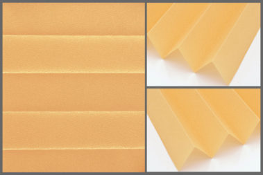 Presto P105 – uniwersalna tkanina plisowana do wnętrz, zapewniająca naturalne oświetlenie w kolorze jasnopomarańczowym.	