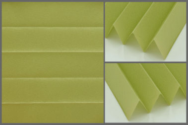 Presto P115 – uniwersalna tkanina plisowana do wnętrz, zapewniająca naturalne oświetlenie w kolorze zielonym.	