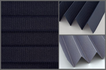 Tkanina plisowana Tosca Pearl 7436 z zaciemniającą strukturą w kolorze czarnym i srebrzystym tyłem odbijającym promienie słoneczne	